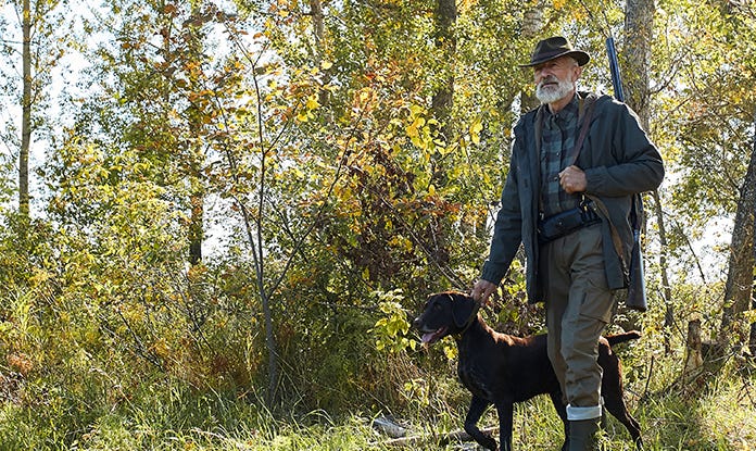 jagdhaftpflicht-jaeger-mit-hund-im-wald-teaser.jpg